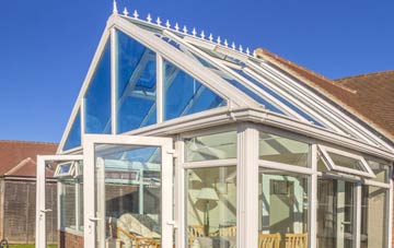 conservatory roof insulation costs Llanrhaeadr Ym Mochnant